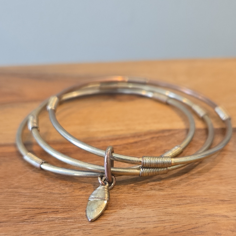 Gold/Bronze 3 Bangle Bracelets with Leaf Charm has tarnishing